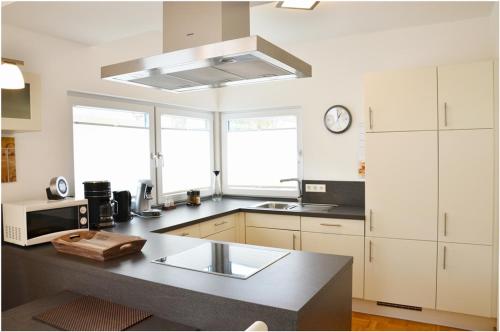 Kitchen, Apartments Boardinghaus Norderney in Norderney