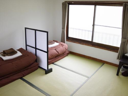 Single Bed in Female Dormitory Room