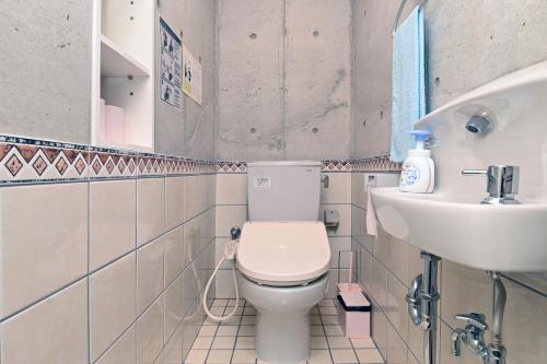 Bathroom, Hotel Niraikanai in Nanjo