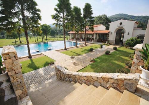 Swimming pool, Mela Garden Retreat Cottage in Lamphaya Klang