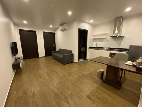 Kitchen, Novatel Hotel and Apartment in City Center / Sat Market