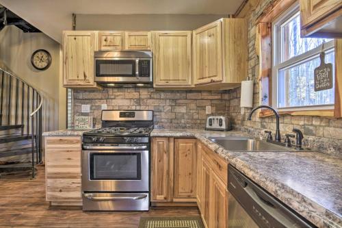 Stylish Creekside Cabin with Fire Pit Near Wineries in Pittsville, USA