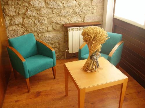 Koplietošanas atpūtas telpa ar TV, Hotel Torrepalacio in Proasa