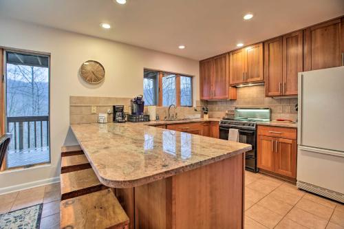 Large Hillside Home with Spacious Deck and Game Room! - image 8