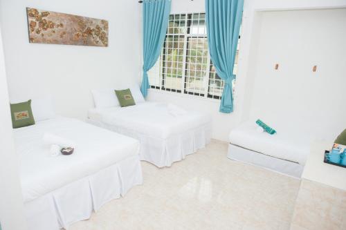 IBAI BEACH GUESTHOUSE