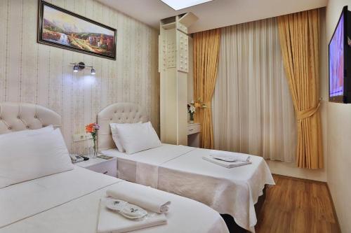 Economy Twin Room image 10