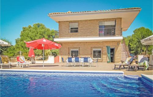 Awesome home in Almodvar del Ro with 5 Bedrooms, WiFi and Outdoor swimming pool