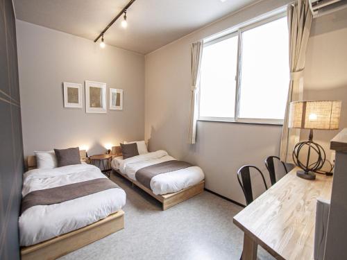 UCHI Living stay KCU Room Type - Family Room with Private Bathroom