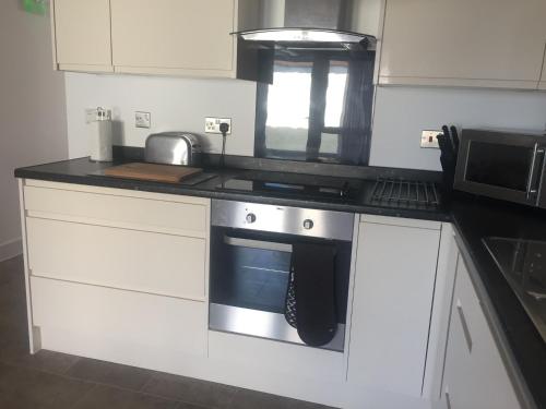 Kitchen, Cloverlea Cottages in Westerleigh