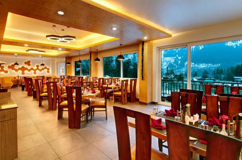 Restaurant, The Orchard Greens Resort - A centrally heated property in Manali