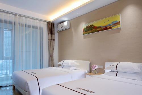 Green Collection Care Hotel (24 Hours Free Transfer from Meilan Airport/Railway Station)
