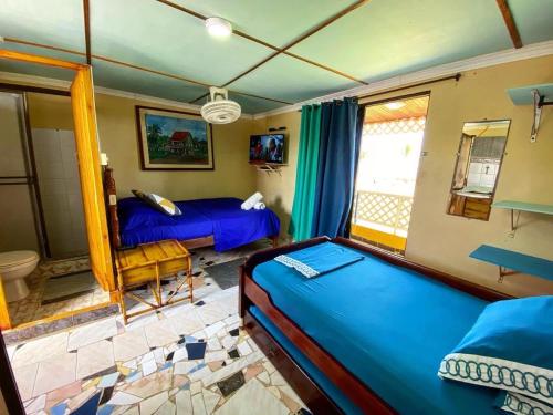 Yellow Moon Guesthouse & Apartments in San Andres Island