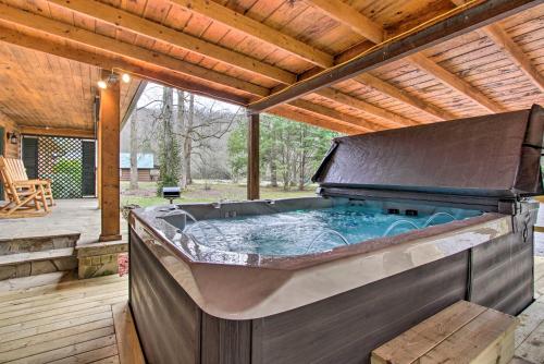 Creekside Cabin with Hot Tub Fire Pit and Game Room! - image 2