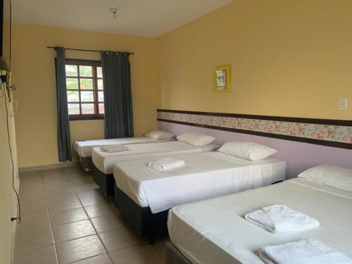 Hotel Canto da Enseada in กวารุจ้า