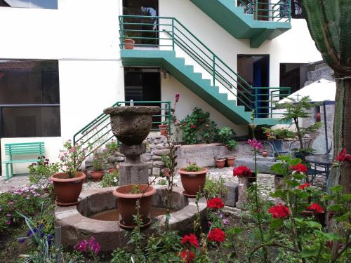 

Home Hoteles Casa Arcopunku