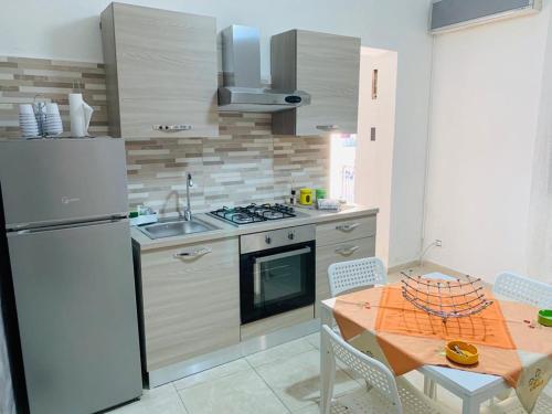 virtuve, Casa Vacanze San Nicolò (Casa Vacanze San Nicolo) in Militello in Val di Catania