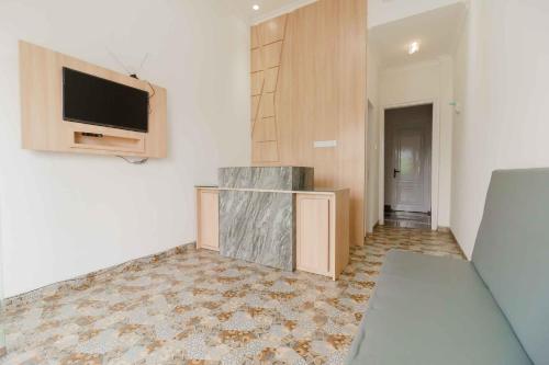 紅多茲Plus伊斯蘭酒店@巴東托莫博士路 RedDoorz Plus Syariah @ Jalan Dr Sutomo Padang