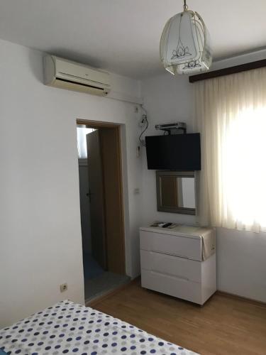 TONA APARTMENTS - image 2