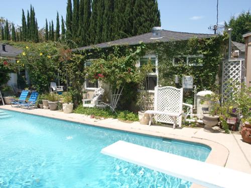 Charming Culver City Cottage with Shared Pool and Garden photo