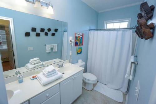 Paradise on Nautical Watch **Pool Just Steps Away** secondary