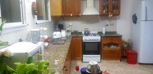 Kitchen, Green House.river in Celedonio Escalada