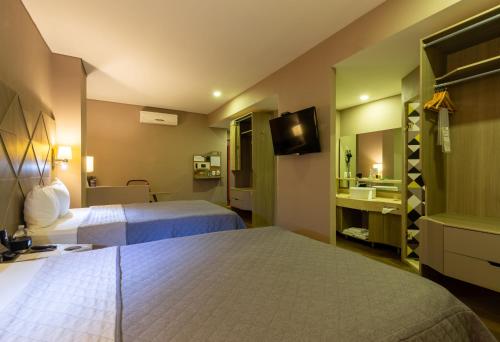 Hotel Glow Point - Mulza in León, Mexico