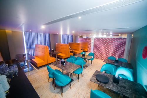 Krogs/atpūtas telpa, Fortune Plaza Hotel in Varamballi