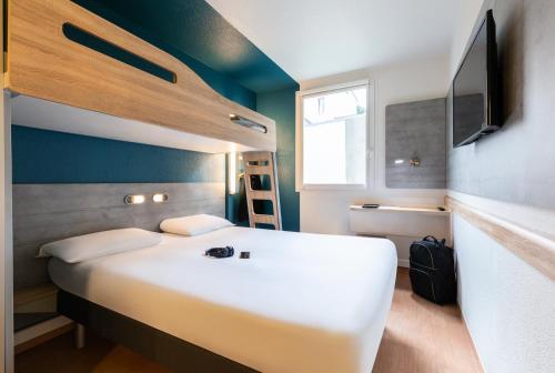 photo chambre ibis budget Reims Thillois