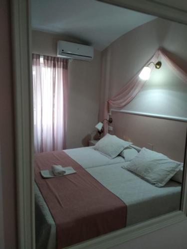  Emperador Augusto, Pension in Mérida