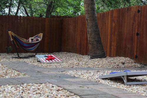 Vibrant, Colorful Condo Building with Backyard Firepit and Games