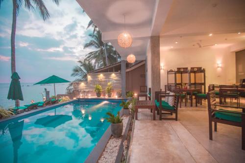 Spend the Day Package - (9 AM - 5 PM) - Pool use, Lunch & Evening Tea or Coffee room in Sea World Boutique Hotel