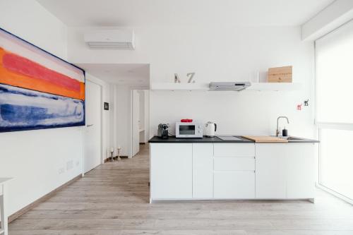 One-Bedroom Apartment room in Mark's Gallery Apartment by MyHomeInComo