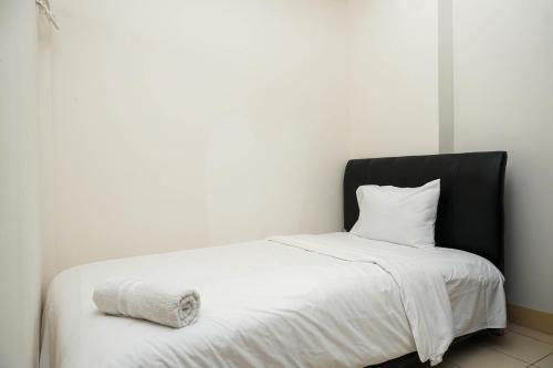 Simply Furnished 2BR Apartment at Puri Park View By Travelio