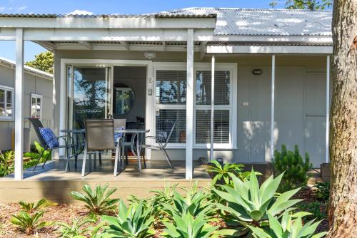 Calm Waters Waterfront Cottages - Tap to explore photos