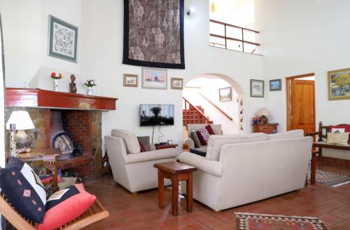 Shared lounge/TV area, Francolin Cottage at Great Rift Valley Lodge & Golf Resort Naivasha in Naivasha