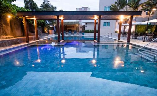 Swimming pool, Hotel Morada do Sol in Vila Olegario