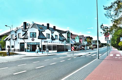 Apartamenty Mesa Grill Restaurant Cafe - Accommodation - Dźwirzyno