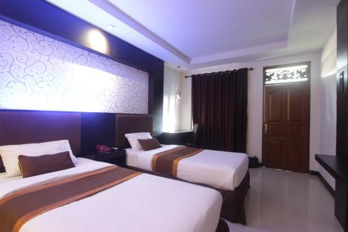 Taman Agung Hotel Stop at Taman Agung Hotel to discover the wonders of Bali. The property has everything you need for a comfortable stay. Service-minded staff will welcome and guide you at Taman Agung Hotel. Each guest