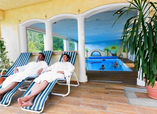 Úszómedence, Marchenhotel 3 Sterne Superior Waldpension Nebelstein in Moorbad Harbach