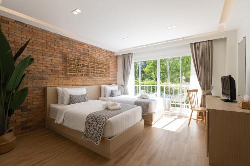 VAYNA Boutique Koh Chang Room Type - Tropical Thai Twin room with Balcony