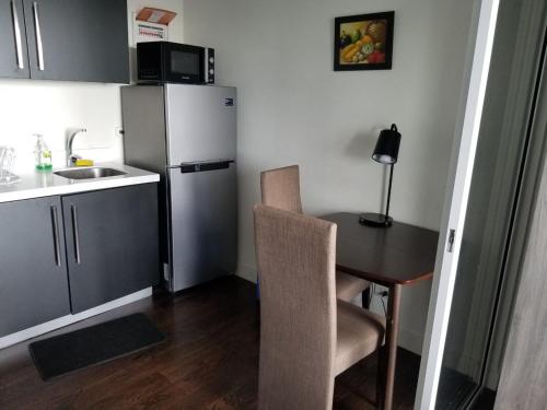 Vibrant 1BR Acqua Livingstone with Netflix, Pool & Gym, Manila (fotografie 8)
