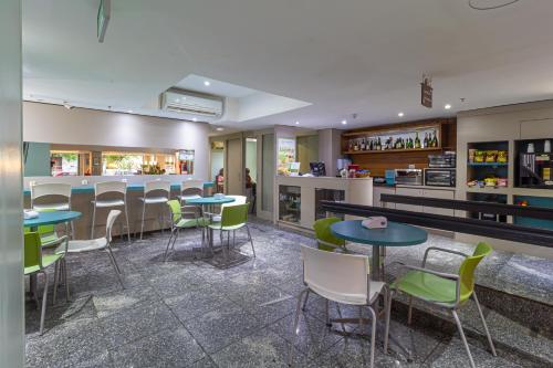 餐廳, Eko Residence Hotel - próximo a Santa Casa e Auditório Araujo Vianna (Eko Residence Hotel - proximo a Santa Casa e Auditorio Araujo Vianna) in 阿雷格里港市中心