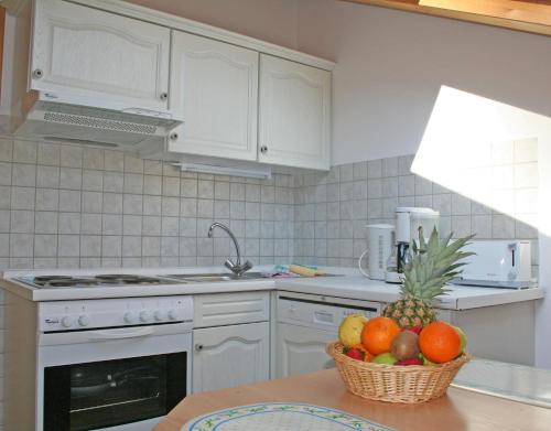مطبخ, فيرينهاوس أم رومرفيخ (Ferienhaus am Romerweg) in Krun