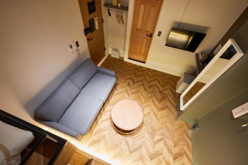 Comfort Quadruple Room - No Cleaning for Consecutive Night Stays image 10