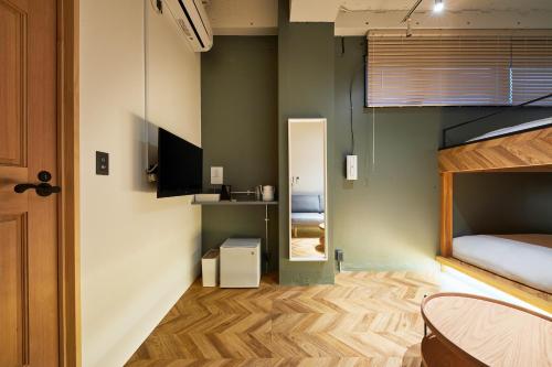 Comfort Quadruple Room - No Cleaning for Consecutive Night Stays image 9