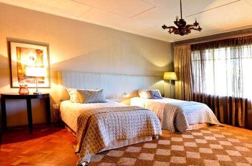 THE WHITE HOUSE Room Type - Deluxe King Suite