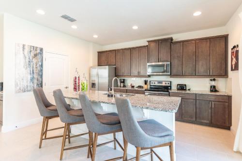 Remarkable Home near Disney with Water Park Included by Rentyl - 7705F in Orlando, USA