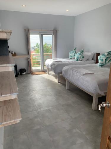 Crown Malapascua Room Type - Deluxe Queen Room with Two Queen Beds Crown Malapascua Room Type - Deluxe Queen Room with Two Queen Beds