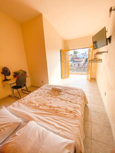 Hotel dos Sonhos Ideally located in the prime touristic area of Sao Tome Das Letras, Hospedaria dos Sonhos promises a relaxing and wonderful visit. Offering a variety of facilities and services, the hotel provides all