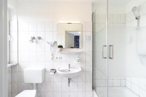 Ванна кімната, Hotel Fresh INN in Унтерахтінг